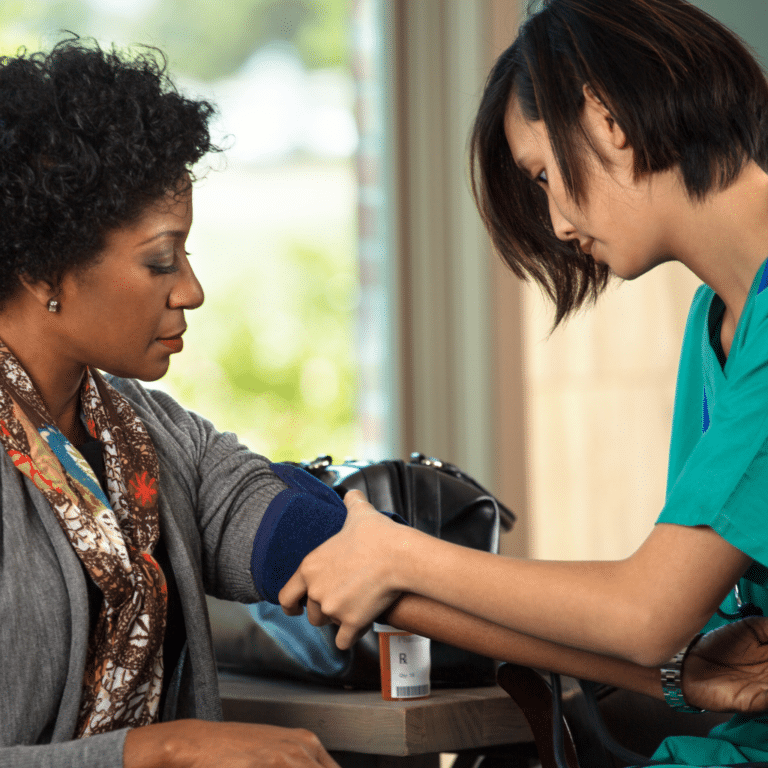 Women Getting Her Blood Pressure Checked
